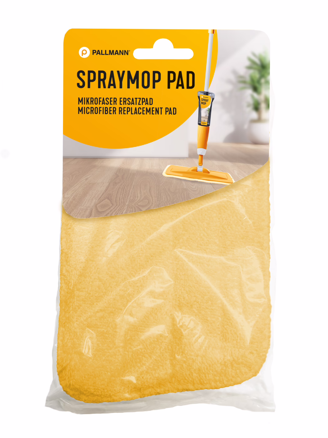 PALLMANN_Dummy_Spraymop Ersatz Pad_msl_2025_04 Almohadilla de repuesto de microfibra amarilla envasada para spraymop de la marca Pallmann. El encabezado naranja y blanco muestra 'SPRAYMOP PAD' y una imagen de un spraymop naranja sobre un suelo de madera; la almohadilla amarilla es visible a través del plástico transparente. Escena interior luminosa y limpia con una planta en maceta desenfocada al fondo.